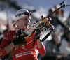Linda Grubben of Norway getting ready for shooting during women pursuit race on Pokljuka, Slovenia. IBU Biathlon World Cup sprint race was held on Pokljuka, Slovenia on 19th of January 2007.
