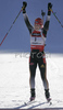 Winner Kati Wilhelm of Germany celebrating her victory when crossing finish line in women pursuit race on Pokljuka, Slovenia. IBU Biathlon World Cup sprint race was held on Pokljuka, Slovenia on 19th of January 2007.
