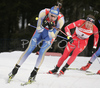 Bjorn Ferry of Sweden (L) followed by Emil Hegle Svendsen of Norway (R) skiing in men pursuit race on Pokljuka, Slovenia. IBU Biathlon World Cup sprint race was held on Pokljuka, Slovenia on 20th of January 2007.
