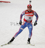 Sergei Rozhkov of Russia skiing out of shooting place after last shooting in men pursuit race on Pokljuka, Slovenia. IBU Biathlon World Cup sprint race was held on Pokljuka, Slovenia on 20th of January 2007.
