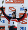 Third placed Vincent Defrasne of France  celebrating his  medal won in men pursuit race on Pokljuka, Slovenia. IBU Biathlon World Cup sprint race was held on Pokljuka, Slovenia on 20th of January 2007.
