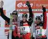 Winner Christoph Sumann of Austria (M), second placed Alexander Wolf of Germany (L) and third placed Vincent Defrasne of France (R) celebrating their medals won in men pursuit race on Pokljuka, Slovenia. IBU Biathlon World Cup sprint race was held on Pokljuka, Slovenia on 20th of January 2007.

