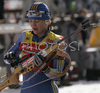 Anna Carin Olofsson of Sweden getting ready for shooting in women mass start race on Pokljuka, Slovenia. IBU Biathlon World Cup sprint race was held on Pokljuka, Slovenia on 21th of January 2007.

