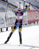 Winner Oksana Khvostenko of Ukrain celebrating her victory in women mass start race on Pokljuka, Slovenia. IBU Biathlon World Cup sprint race was held on Pokljuka, Slovenia on 21th of January 2007.

