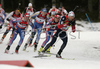 Raphael Poiree of France leading group of biathletes on downhill in men mass start race on Pokljuka, Slovenia. IBU Biathlon World Cup sprint race was held on Pokljuka, Slovenia on 21th of January 2007.
