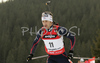 Second placed Vincent Defrasne of France skiing in men mass start race on Pokljuka, Slovenia. IBU Biathlon World Cup sprint race was held on Pokljuka, Slovenia on 21th of January 2007.
