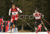 Winner Christoph Sumann of Austria (L) and third placed Andreas Birnbacher of Germany (R) skiing in men mass start race on Pokljuka, Slovenia. IBU Biathlon World Cup sprint race was held on Pokljuka, Slovenia on 21th of January 2007.
