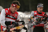 Winner Christoph Sumann of Austria (L) and third placed Andreas Birnbacher of Germany (R) are getting ready for third shooting in men mass start race on Pokljuka, Slovenia. IBU Biathlon World Cup sprint race was held on Pokljuka, Slovenia on 21th of January 2007.
