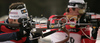 Second placed Vincent Defrasne of France (L) and Frode Andresen of Norway (R) shooting in men mass start race on Pokljuka, Slovenia. IBU Biathlon World Cup sprint race was held on Pokljuka, Slovenia on 21th of January 2007.
