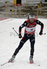 Second placed Vincent Defrasne of France leaving shooting place after last shooting in men mass start race on Pokljuka, Slovenia. IBU Biathlon World Cup sprint race was held on Pokljuka, Slovenia on 21th of January 2007.
