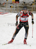 Third placed Andreas Birnbacher of Germany leaving shooting place after last shooting in men mass start race on Pokljuka, Slovenia. IBU Biathlon World Cup sprint race was held on Pokljuka, Slovenia on 21th of January 2007.

