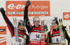 Winner Christoph Sumann of Austria (M), second placed Vincent Defrasne of France (L) and third placed Andreas Birnbacher of Germany (R) celebrating their medals won in men mass start race on Pokljuka, Slovenia. IBU Biathlon World Cup sprint race was held on Pokljuka, Slovenia on 21th of January 2007.
