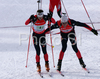 Ferreol Cannard of France  (R) putting his teammate Vincent Defrasne (L) into action in men relay race of e.on Ruhrgas IBU Biathlon World Cup. Men relay race of e.on Ruhrgas IBU Biathlon World Cup was held in Pokljuka, Slovenia, on 16th of December 2007.
