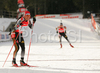 Michael Greis of Germany  (L) waiting for his teammate Andreas Birnbacher (R) on last switch in men relay race of e.on Ruhrgas IBU Biathlon World Cup. Men relay race of e.on Ruhrgas IBU Biathlon World Cup was held in Pokljuka, Slovenia, on 16th of December 2007.
