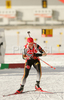Michael Greis of Germany  leaving shooting place in men relay race of e.on Ruhrgas IBU Biathlon World Cup. Men relay race of e.on Ruhrgas IBU Biathlon World Cup was held in Pokljuka, Slovenia, on 16th of December 2007.
