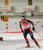 Simon Fourcade of France leaving shooting place in men relay race of e.on Ruhrgas IBU Biathlon World Cup. Men relay race of e.on Ruhrgas IBU Biathlon World Cup was held in Pokljuka, Slovenia, on 16th of December 2007.
