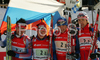 Russian biathlon relay team with Andrei Makoveev (R), Dmitri Yaroshenko (2nd from R), Maxim Tchoudov (2nd from L) and Nikolay Kruglov (L) celebrating their victory in men relay race of e.on Ruhrgas IBU Biathlon World Cup. Men relay race of e.on Ruhrgas IBU Biathlon World Cup was held in Pokljuka, Slovenia, on 16th of December 2007.
