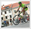 Cyclists riding their bikes during road cycling race across the streets of Kranj. Cyclists had to finish more then 30 laps through streets of Kranj, before they had chance to sprint uphill for last time and try to win race. Valter Bonca of Sava Kranj won race after he was in leading group of three cyclists for more then 20 laps.
