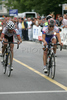 Second placed Miha Svab of Adria Mobil (R) and third placed Uros Silar of Team Swiag Teka (L) are crossing finish line of criterium road cycling race Around city of Kranj 2006 which was held in Kranj, Slovenia on 4th of June 2006.
