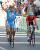 Paolo Bettini of Italy (L) is celebrating his victory on finish line when outsprinting Erik Zabel of Germany (R) and Alejandro Valverde Belmonte of Spain (back)  in Men Elite road races of Road Cycling World Championship in Salzburg, Austria. Men Elite road race was final race of Road Cycling World Championship 2006 and was held in Salzburg, Austria on 24. September 2006.
