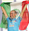 Paolo Bettini of Italy celebrating his medal and World Championship title won in Men Elite road races of Road Cycling World Championship in Salzburg, Austria. Men Elite road race was final race of Road Cycling World Championship 2006 and was held in Salzburg, Austria on 24. September 2006.

