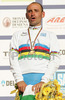Paolo Bettini of Italy is singing national anthem and celebrating his medal and World Championship title won in Men Elite road races of Road Cycling World Championship in Salzburg, Austria. Men Elite road race was final race of Road Cycling World Championship 2006 and was held in Salzburg, Austria on 24. September 2006.
