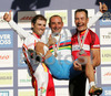 Second placed Erik Zabel of Germany (R) and third placed Alejandro Valverde Belmonte of Spain lifted winner and new World Champion Paolo Bettini of Italy into air when celebrating their medals after Men Elite road races of Road Cycling World Championship in Salzburg, Austria. Men Elite road race was final race of Road Cycling World Championship 2006 and was held in Salzburg, Austria on 24. September 2006.
