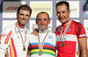 Winner Paolo Bettini of Italy (M), second placed Erik Zabel of Germany (R) and third placed Alejandro Valverde Belmonte of Spain (L) celebrating their medals after Men Elite road races of Road Cycling World Championship in Salzburg, Austria. Men Elite road race was final race of Road Cycling World Championship 2006 and was held in Salzburg, Austria on 24. September 2006.
