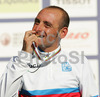 Winner Paolo Bettini of Italy tasting his gold medals after Men Elite road races of Road Cycling World Championship in Salzburg, Austria. Men Elite road race was final race of Road Cycling World Championship 2006 and was held in Salzburg, Austria on 24. September 2006.
