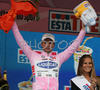 Leader in general classification Danilo Di Luca of Liquigas celebrates another day in pink jersey at the end of stage 19 of Giro d Italia 2007. Stage 19 in length of 178km lead cyclists from Treviso, Italy to Terme di Comano, Italy, and was held on 1st of June 2007.
