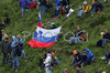 Slovenian cycling fans with Slovenian flag at last climb of the stage 17 of Giro d Italia 2007. Stage 17 in length of 142km lead cyclists from Lienz, Austria to Monte Zoncolan, Italy, and was held on 30th of May 2007.

