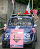 Fans in  special Giro car at finish of stage 18 of Giro d Italia 2007. Stage 18 in length of 208km lead cyclists from Udine, Italy to Riese Pio X, Italy, and was held on 31st of May 2007..
