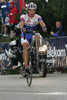 Simon Spilak of Adria Mobil still shows some power when he is crossing finish line on top of Vrsic on back wheel during fourth stage of Tour de Slovenie 2007. Fourth stage in lenght of 160km lead cyclists from Kranjska Gora, Slovenia to top of Tour de Slovenia, 1611 meters high pass Vrsic, Slovenia.
