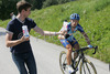 Matic Strgar of Radenska Powerbar receiving water from assistant during Road cycling National championships. Road cycling National championship was held in Polhov Gradec, Slovenija on 1st of July 2007.
