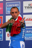 Winner Paolo Bettini of Italy celebrating his gold medal and World Champion title won in Men Elite road race of UCI Road Cycling World Championships. Men Elite road race World Championships was held on 30th of September 2007 in Stuttgart, Germany.
