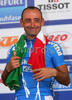 Winner Paolo Bettini of Italy celebrating his gold medal and World Champion title won in Men Elite road race of UCI Road Cycling World Championships. Men Elite road race World Championships was held on 30th of September 2007 in Stuttgart, Germany.
