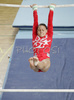 Lorena Coza of Italy during exercise on bars at Siska Gym International 2006 competition. Finals of Siska Gym International 2006 competition for women on vault, bars, beam and floor were held in Sport Center Gib in Ljubljana, Slovenia on 5th of November 2006.
