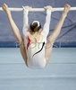 Jolien Eggermont of Beligum during exercise on bars at Siska Gym International 2006 competition. Finals of Siska Gym International 2006 competition for women on vault, bars, beam and floor were held in Sport Center Gib in Ljubljana, Slovenia on 5th of November 2006.
