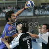 Renato Vugrinec of Portland San Antonio (L) going for goal, while David Korazija of RK Gold Club (R) was trying to hinder him during 1/8 finals handball match of EHF Champions League between RK Gold club Hrpelje, Slovenia and Portland San Antonio, Spain. Match was held in Bonifika hall in Koper, Slovenia on 3rd of December 2006. First 1/8 finals match was won by Portland San Antonion with 23:34.
