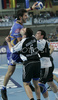 Renato Vugrinec of Portland San Antonio (L) going for goal, while David Korazija of RK Gold Club (R) was trying to hinder him during 1/8 finals handball match of EHF Champions League between RK Gold club Hrpelje, Slovenia and Portland San Antonio, Spain. Match was held in Bonifika hall in Koper, Slovenia on 3rd of December 2006. First 1/8 finals match was won by Portland San Antonion with 23:34.
