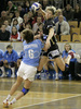 Marina Vergelyuk-Stri (no.7) of Krim Mercator (R) shooting over Anna Kochetova (no.6) of Dinamo Volgograd (L) during Women Handball Championships League match between Krim Mercator and Dinamo Volgograd. Krim Mercator, Ljubljana, Slovenia was hosting match of 2nd round of Women Handball Championships League against Dinamo Volgograd, Russia in Tivoli Arena on 13th of January 2007. Match was won by Krim Mercator who defeated Dinamo Volgograd 41:33.
