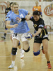 Tatjana Oder (no.17) of Krim Mercator (R) attacking while Aleksandra Stepanova (no.20) of Dinamo Volgograd (L) is trying to hinder her during Women Handball Championships League match between Krim Mercator and Dinamo Volgograd. Krim Mercator, Ljubljana, Slovenia was hosting match of 2nd round of Women Handball Championships League against Dinamo Volgograd, Russia in Tivoli Arena on 13th of January 2007. Match was won by Krim Mercator who defeated Dinamo Volgograd 41:33.
