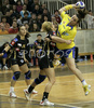 Barbara Brauer (no.30) of Cementos la Union-Ribarroja (R) and Marina Vergelyuk-Stri (no.7) of Krim Mercator (L) during Women Handball Championships League match between Krim Mercator and Cem. la Union-Ribarroja. Krim Mercator, Ljubljana, Slovenia was hosting match of 6th round of Women Handball Championships League against Cem. la Union-Ribarroja, Alaquas, Spain, in Tivoli Arena on 24th of February 2007. Match was won by Krim Mercator with result 34:28.
