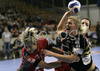 Anja Freser (no.11) of Krim (L) trying to block Karin Isaksson (no.23) of IK Savehof (R) when shooting during match of 5th round of European Champions handball league. Match between RK Krim, Ljubljana, Slovenia, and IK Savehof, Partille, Sweden was played on 5th of January 2008 in Tivoli Arena in Ljubljana, Slovenia. Match was with draw 24:24.
