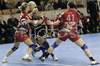 Frida Johansson (no.17) of IK Savehof (M) between Maryna Vergelyuk (no.7) of Krim (L) and Ursa Oven (no.41) of Krim (R) during match of 5th round of European Champions handball league. Match between RK Krim, Ljubljana, Slovenia, and IK Savehof, Partille, Sweden was played on 5th of January 2008 in Tivoli Arena in Ljubljana, Slovenia. Match was with draw 24:24.
