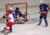 Slovene goalie Gasper Kroselj defending his goal during ice hockey match between Slovenia and Denmark on Ice Hockey World Championship Division I, Group A. Denmark won with 3:2, which gives them good chances for winning tournament and qualifying for Elite Division.
