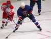 Sabahudin Kovacevic of Slovenia (R) and Kasper Weis of Denmark during ice hockey match between Slovenia and Denmark on Ice Hockey World Championship Division I, Group A. Denmark won with 3:2, which gives them good chances for winning tournament and qualifying for Elite Division.
