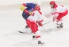Anze Kopitar of Slovenia (L) is trying to pass two Denmarks deffenders, Peter Jensen Regin (M) and Kasper Weis (R) during ice hockey match between Slovenia and Denmark on Ice Hockey World Championship Division I, Group A. Denmark won with 3:2, which gives them good chances for winning tournament and qualifying for Elite Division.
