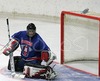 Goalie of Slovene team Gasper Krosel defending his goal during ice hockey match between Slovenia and Germany on Ice Hockey World Championship Division I, Group A. Germany won with 2-0, and Germany also won tournament and is automaticaly qualified for Elite Division. 
