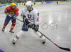 Marcel Rodman (no.22) of Slovenia (R) and Viorel Nicolescu (no.12) of Romania (L) during second third of match of IIHF Division 1 World championships between Slovenia and Romania. Match was won by Slovenia who defeated Romania with 10:1. Match was played in Tivoli Arena in Ljubljana, Slovenia on 15th of April 2007.
